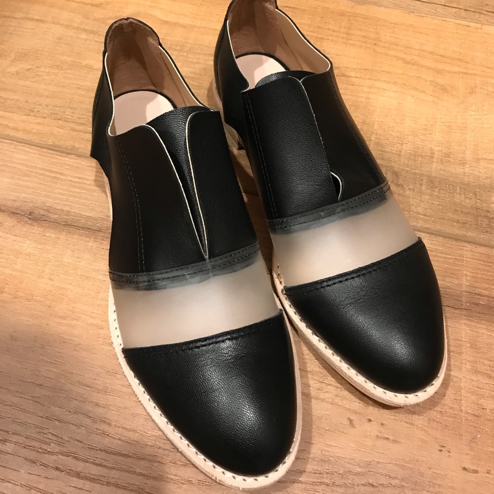 Anthropology Clear Cutout Cowman flats in size 8.5